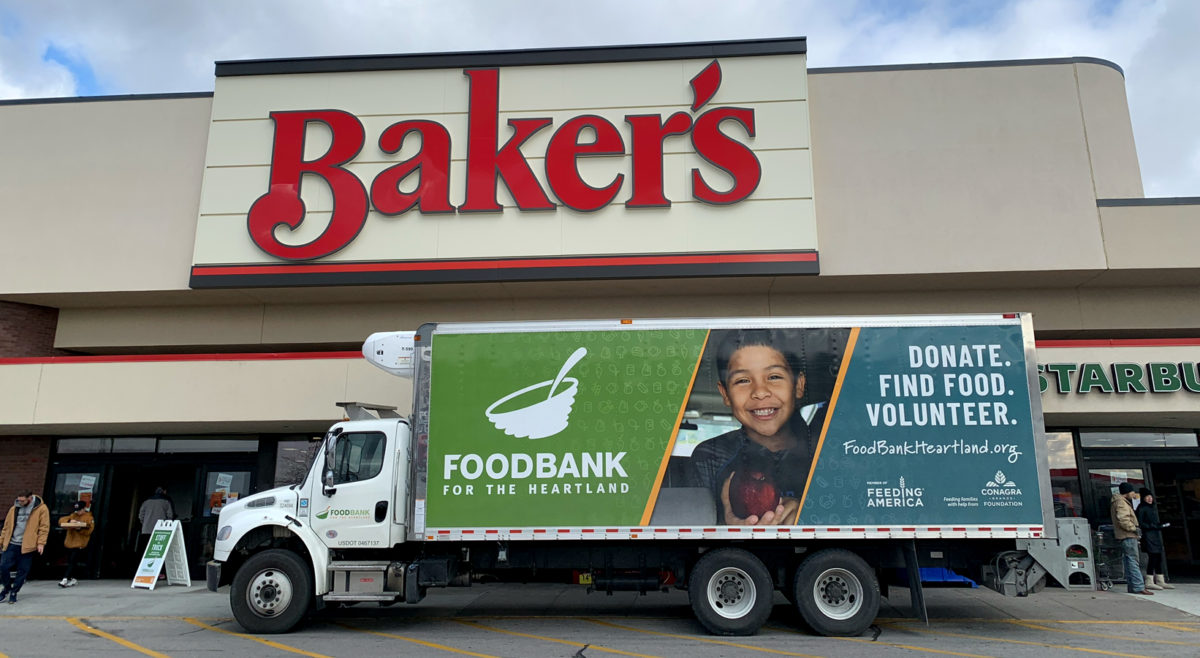 Photo of Food Bank for the Heartland truck in front of Baker's store