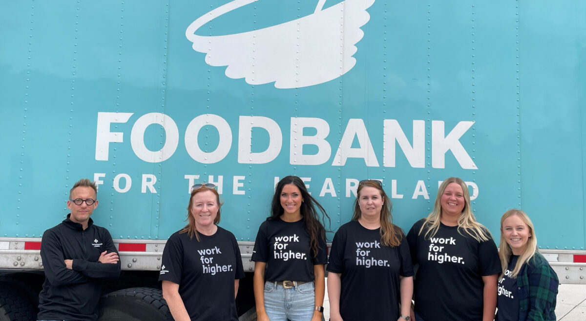 40 Faces of 40 Years Farm Credit Services of America Photo of FCSA group standing in front of a Food Bank trailer