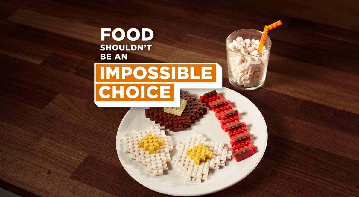 Photo of food that is actually built out of legos with the words Food shouldn't be an impossible choice.