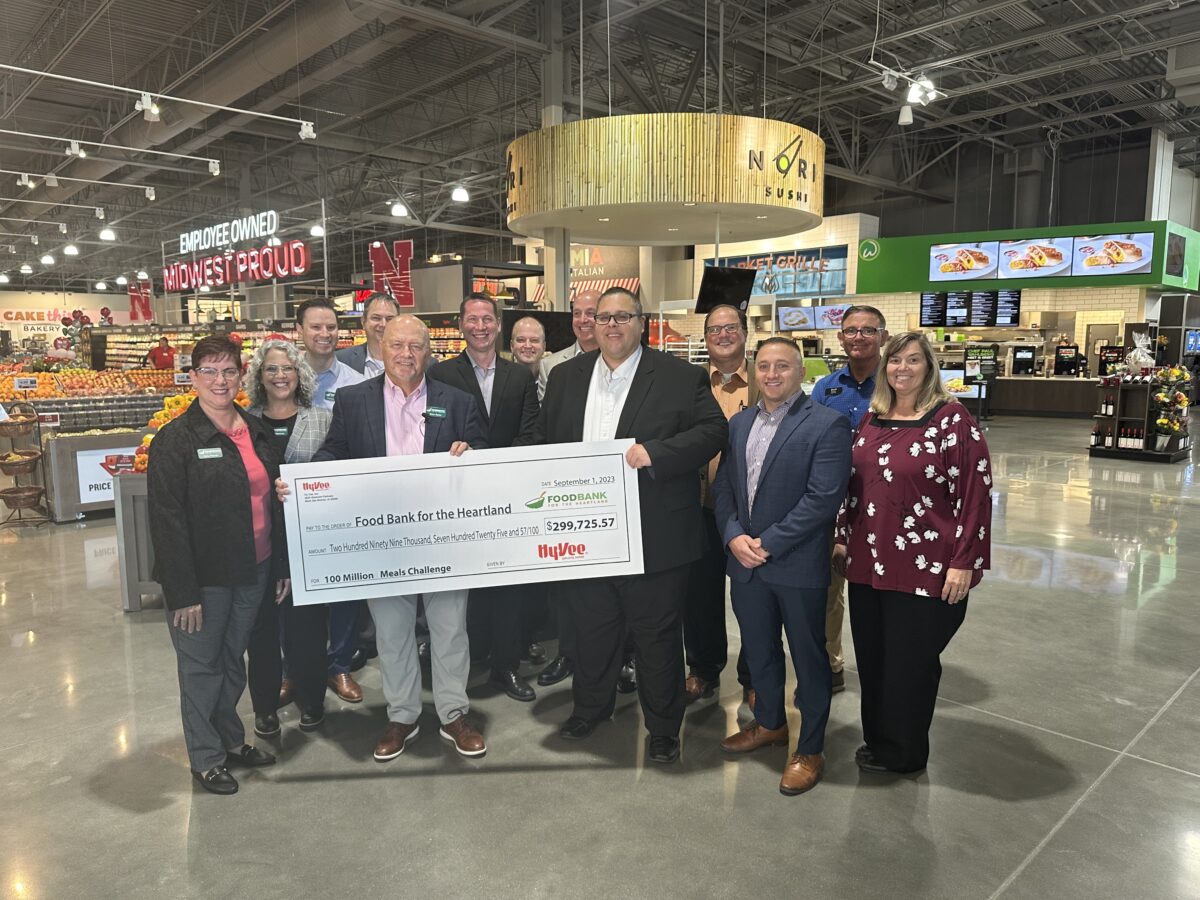 Members of Hy-Vee and Food Bank for the Heartland at check presentation.